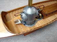 steam engine on wooden boat